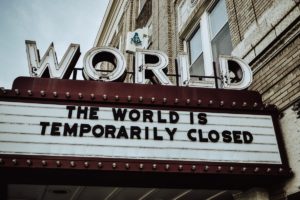 the world is temporarily closed theatre marquee sign