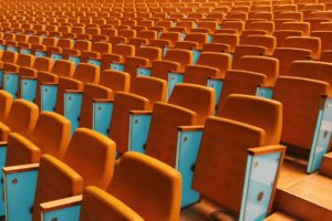 debating chamber with orange chairs